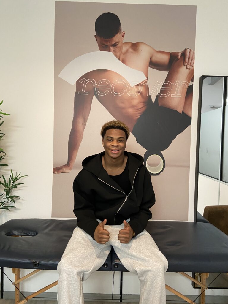Male athlete improving physical performance through physiotherapy