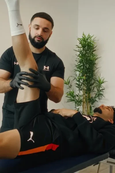 Physiotherapy expert in Manchester providing elite sports injury rehabilitation to an athlete patient at I-Physio